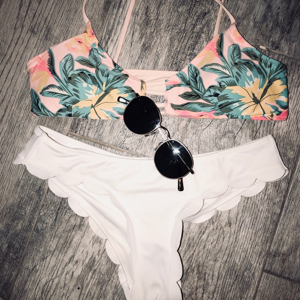 Hawaiian top and white ruffle bottoms.